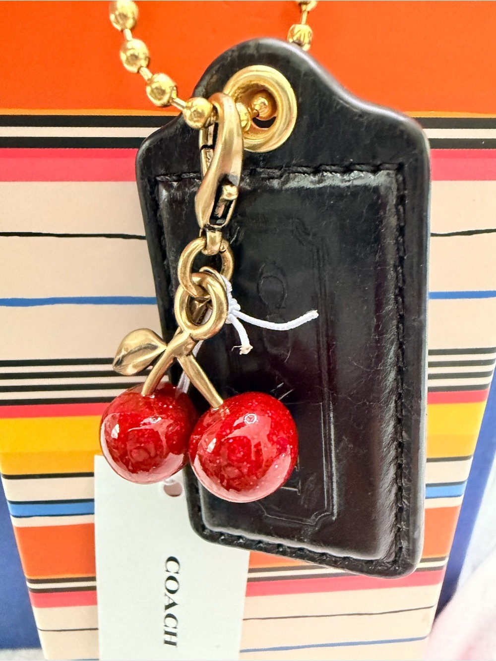 Coach Black leather Raised Hangtag with Red Cherry’s Charm